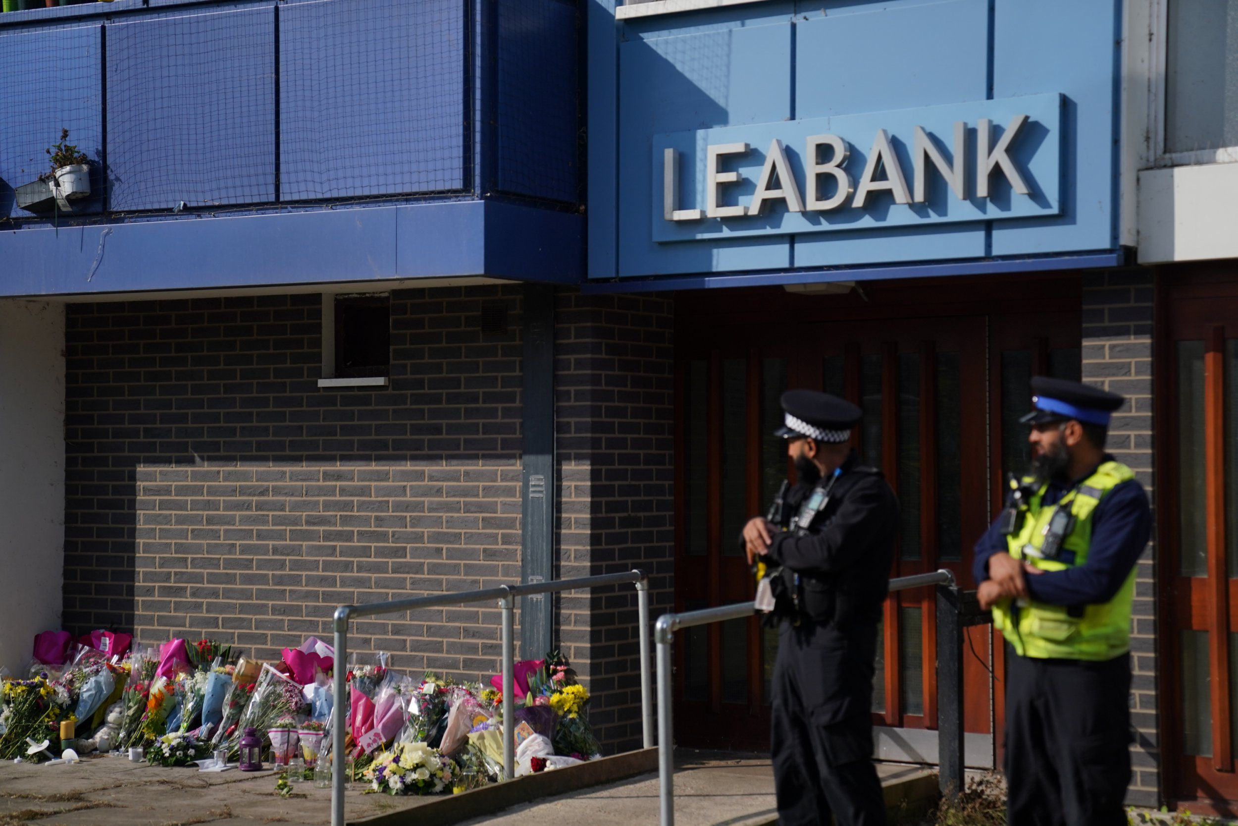 Police officers at Leabank in Luton, Bedfordshire, where three people, believed to be Juliana Prosper, 48, Kyle Prosper, 16, and Giselle Prosper, 13, although formal identification has yet to take place, were found dead in a flat in Leabank, off Wauluds Bank Drive, at around 5.30am on Friday. Nicholas Prosper, 18, of Leabank, Luton, has been charged with the murders of the woman and the two teenagers Bedfordshire Police said. Picture date: Sunday September 15, 2024. PA Photo. See PA story POLICE Leabank. Photo credit should read: Jacob King/PA Wire