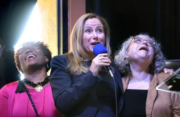 U.S. Rep. Debbie Mucarsel-Powell sharing a laugh with state representatives Rita Harris and Orange County clerk Tiffany Moore Russell during a campaign stop in Orlando, Florida, 2024